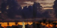 The NASA moon rocket stands ready at sunrise on Pad 39B before the Artemis 1 mission to orbit the moon at the Kennedy Space Center, Monday, Aug. 29, 2022, in Cape Canaveral, Fla. (AP Photo/Brynn Anderson)