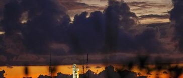 The NASA moon rocket stands ready at sunrise on Pad 39B before the Artemis 1 mission to orbit the moon at the Kennedy Space Center, Monday, Aug. 29, 2022, in Cape Canaveral, Fla. (AP Photo/Brynn Anderson)